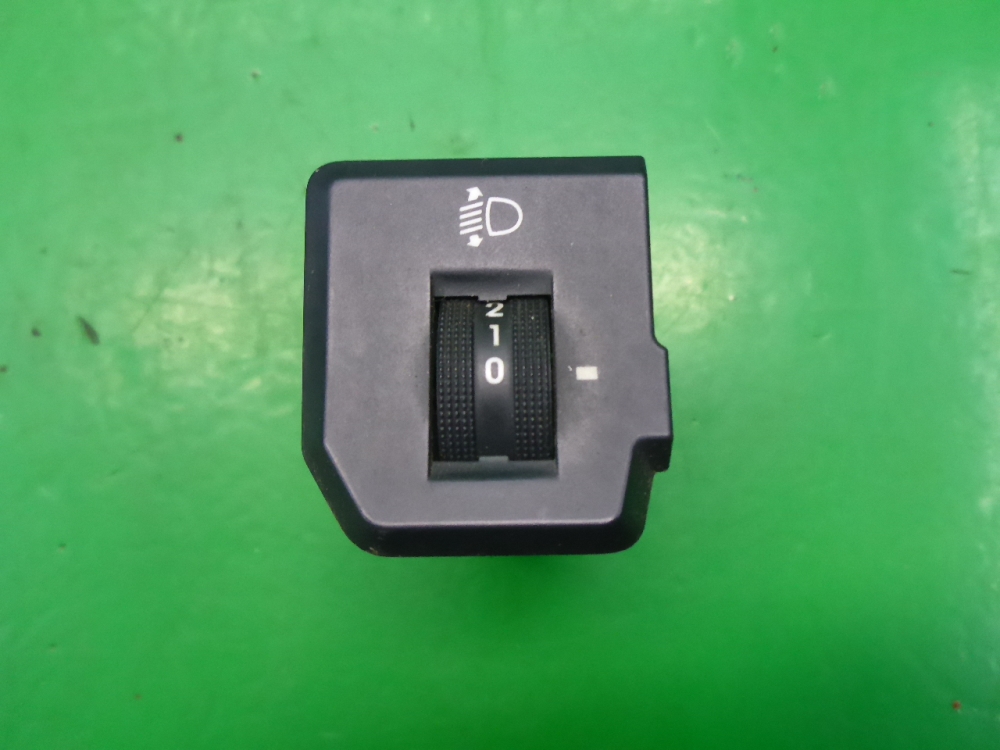 Кнопка корректора фар