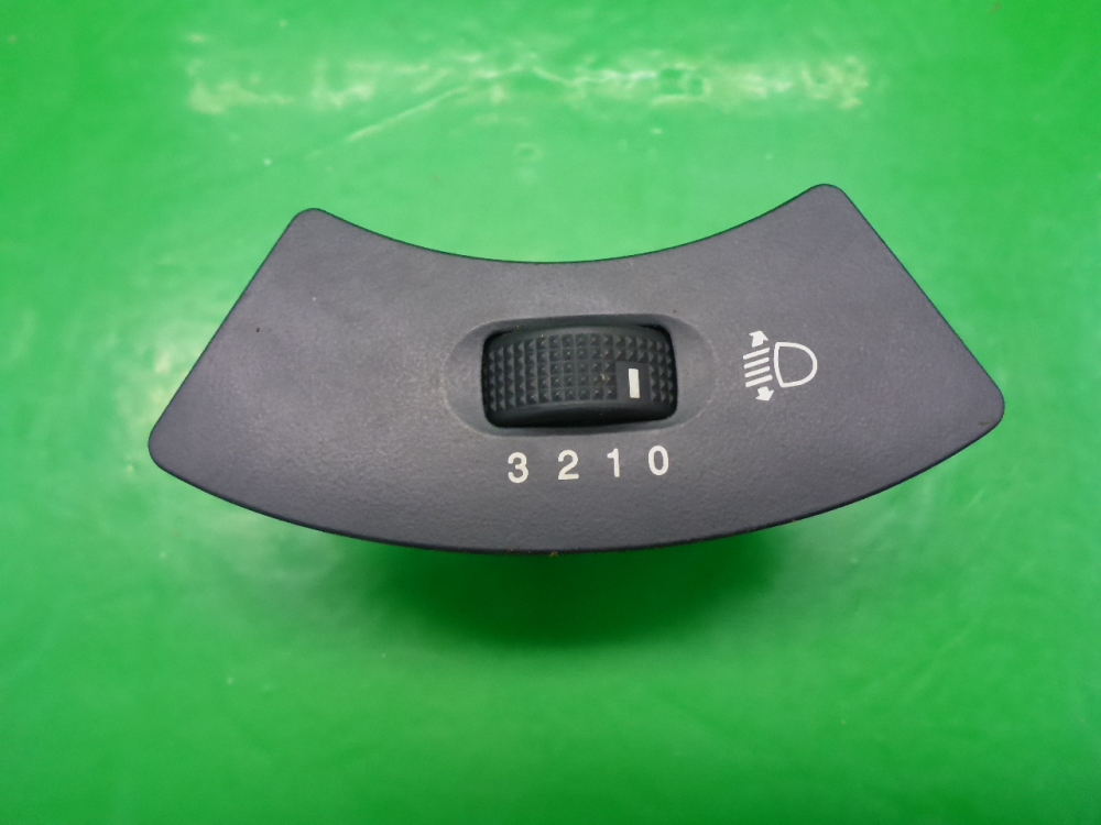 Кнопка корректора фар