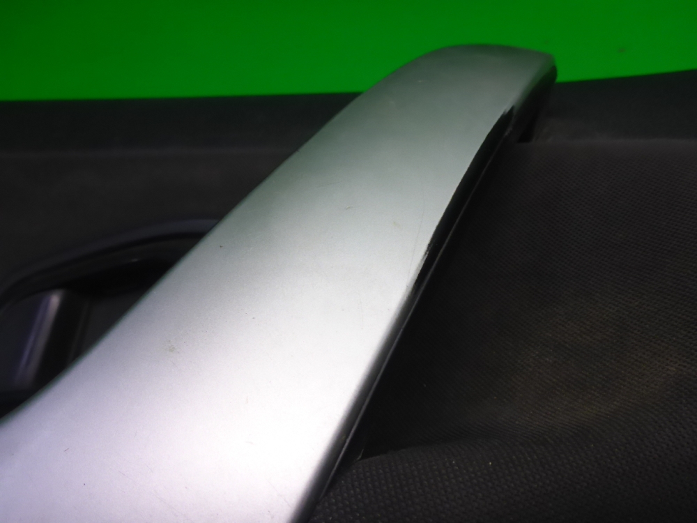 Обшивка двери передней левой