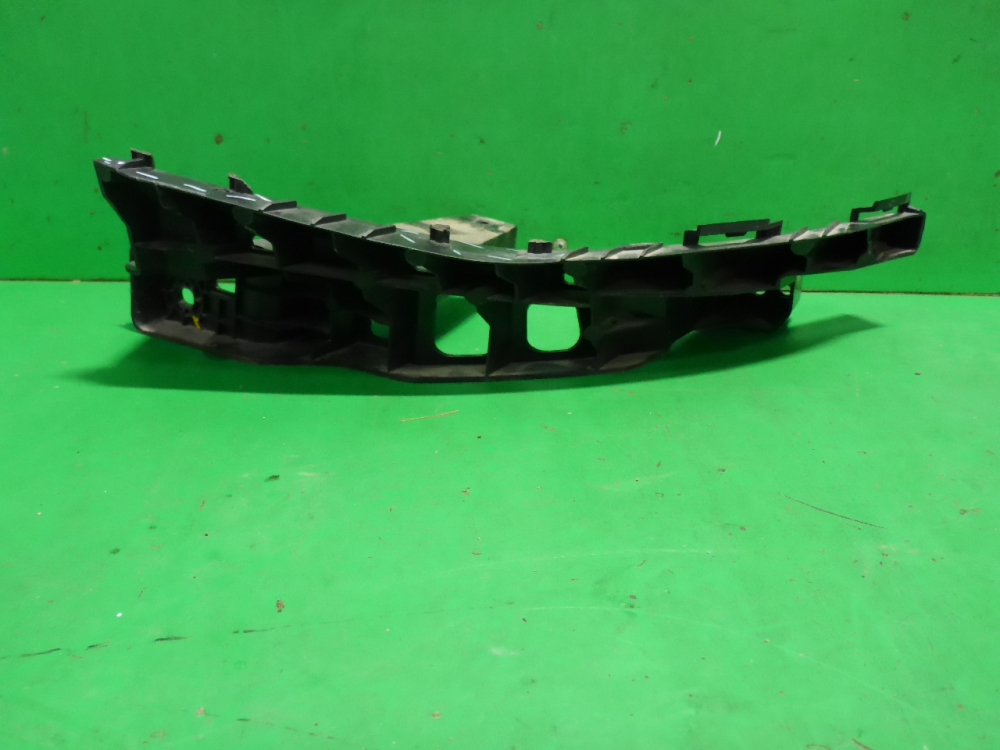 Кронштейн фар левый