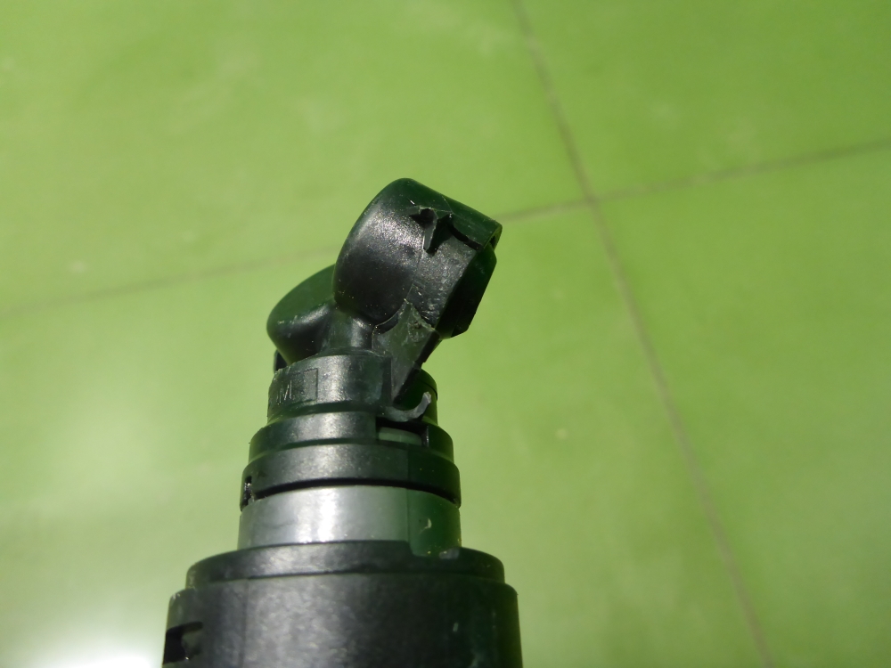 Форсунка омывателя фары