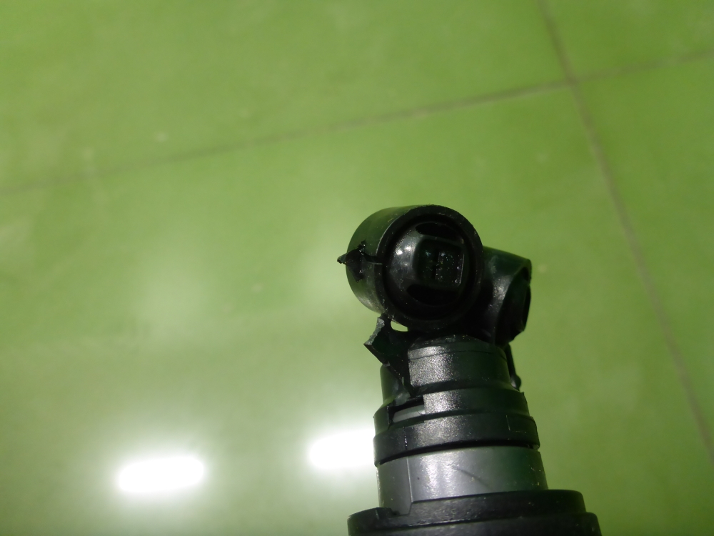 Форсунка омывателя фары