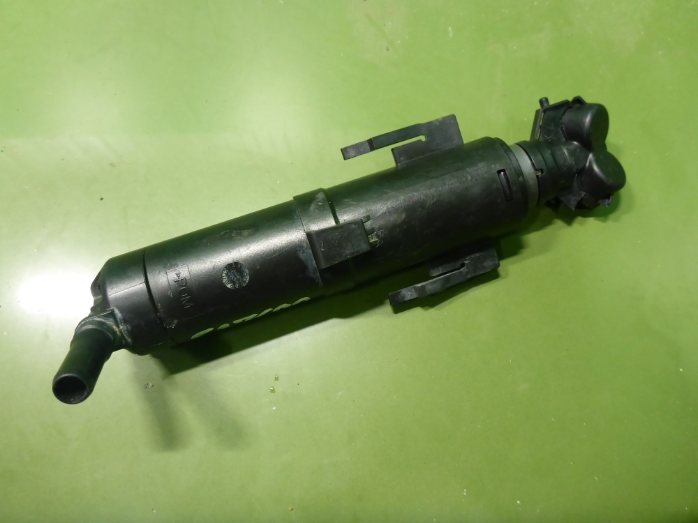 Форсунка омывателя фары