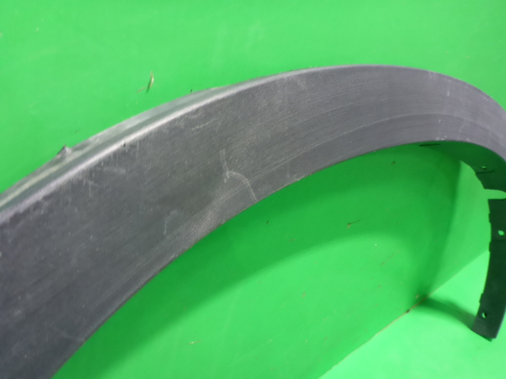 Накладка заднего крыла левого