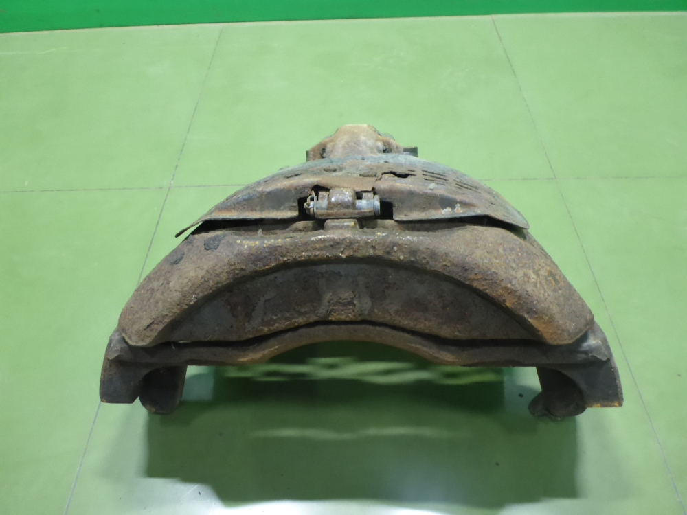 Суппорт передний левый