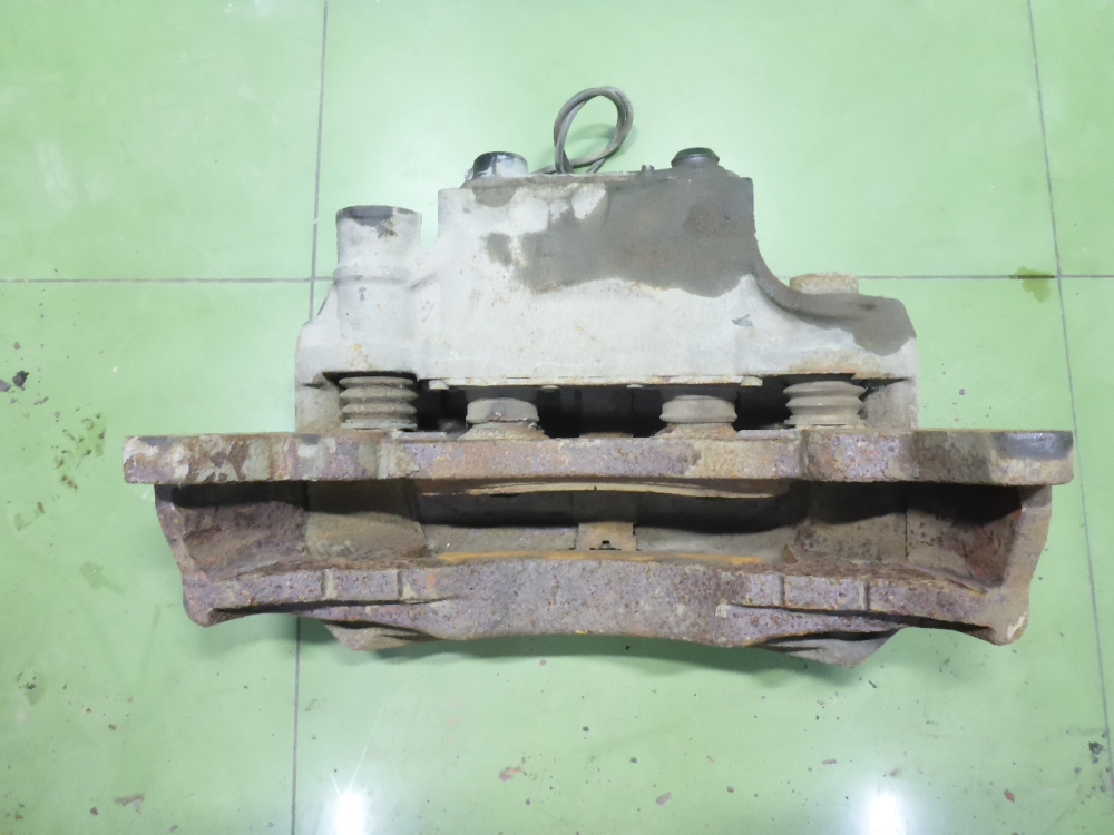 Суппорт задний левый