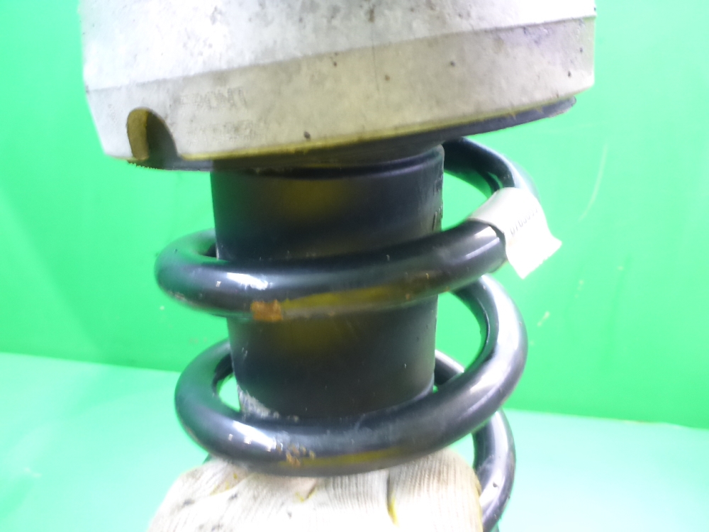 Амортизатор передний левый