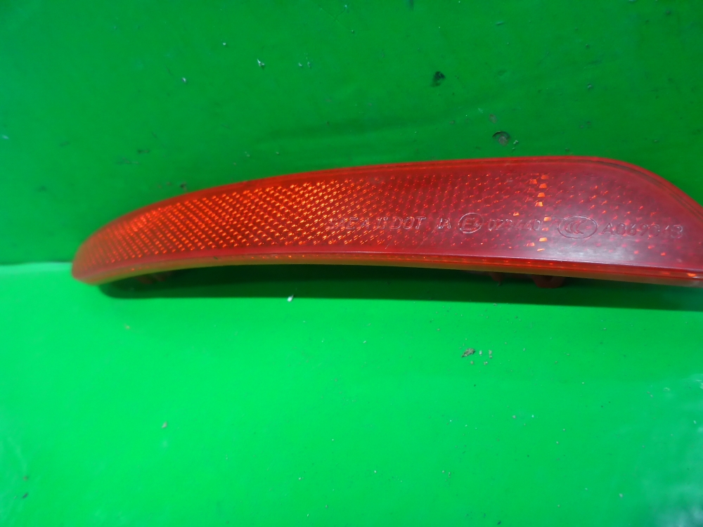 Отражатель в бампер задний левый