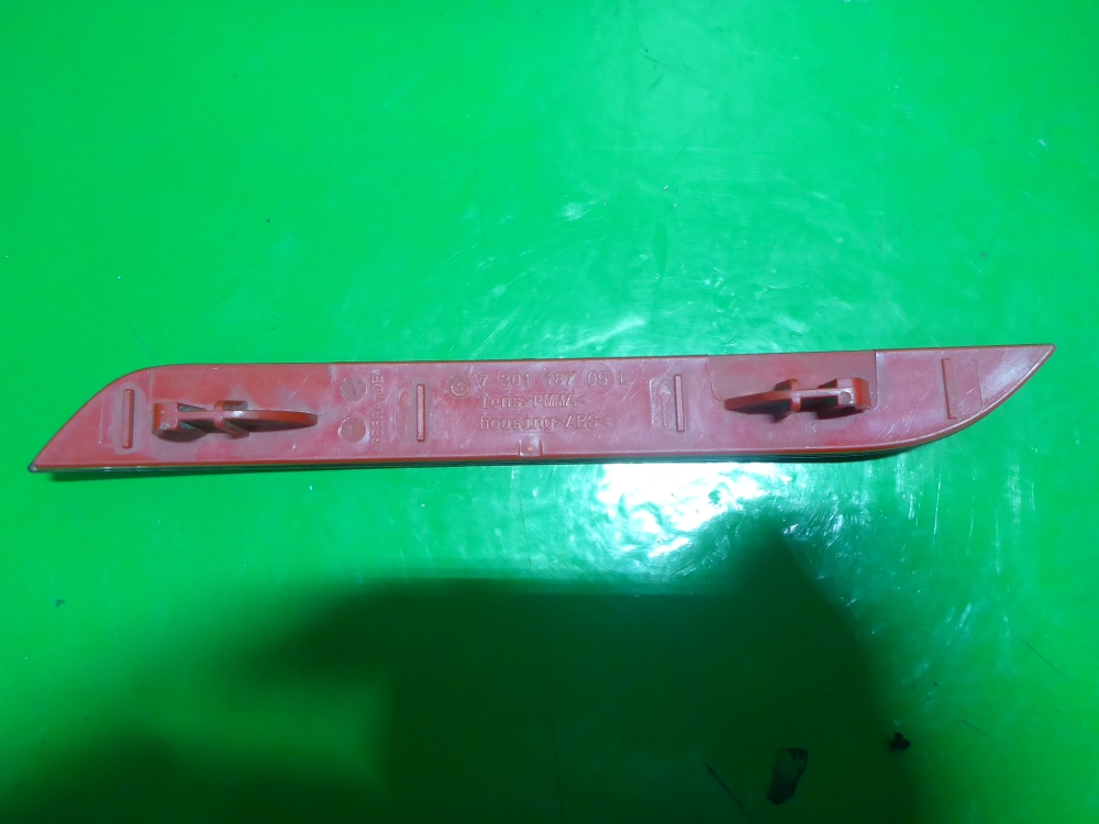 Отражатель в бампер задний левый