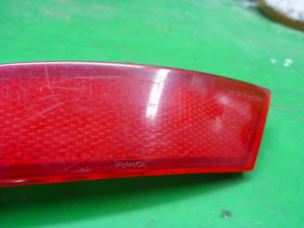 Отражатель в бампер задний левый