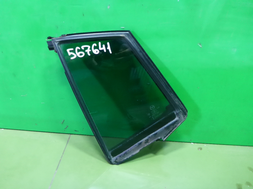 Стекло двери задней левой (форточка)