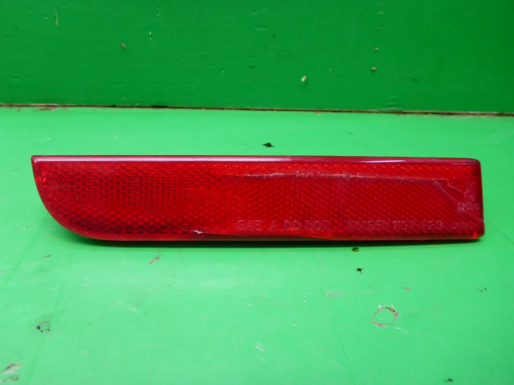 Отражатель в бампер задний левый