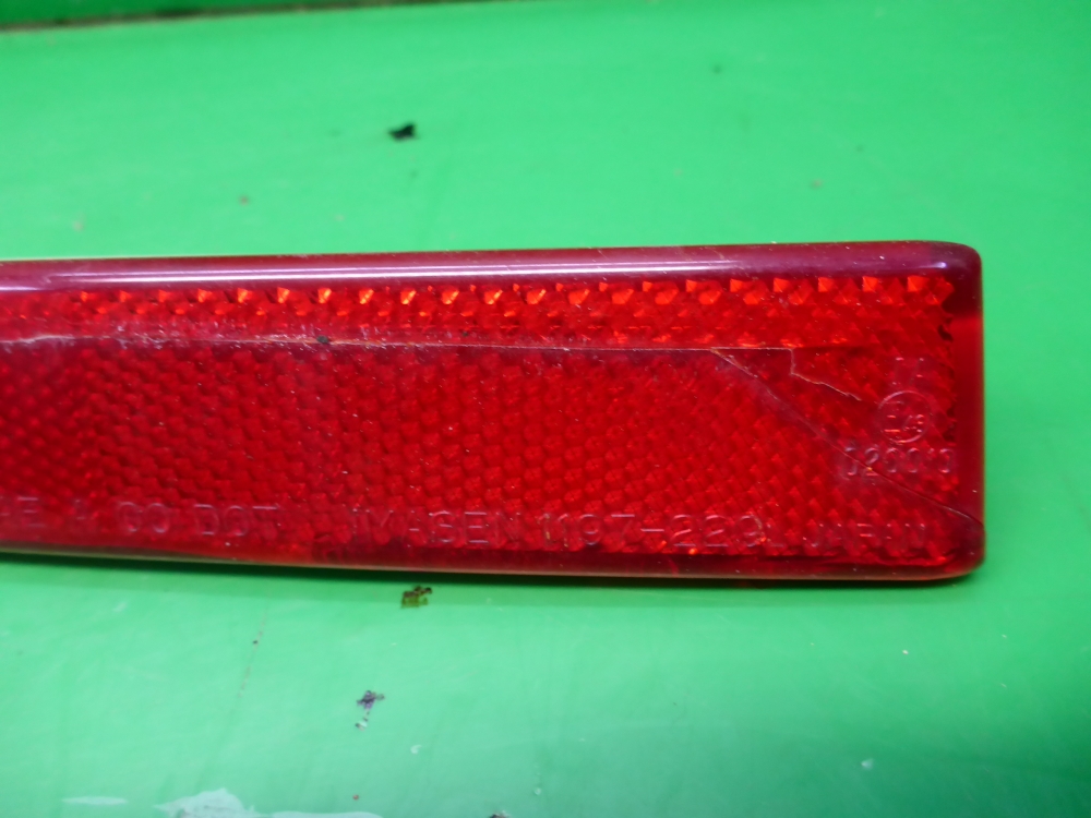 Отражатель в бампер задний левый