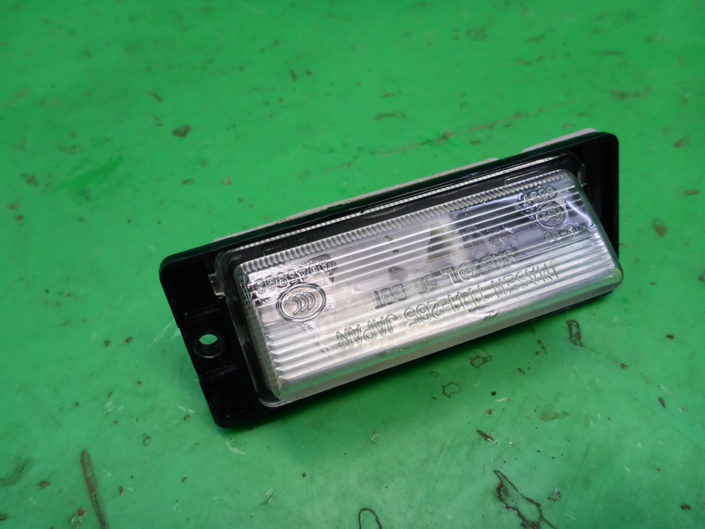 Фонарь подсветки номера