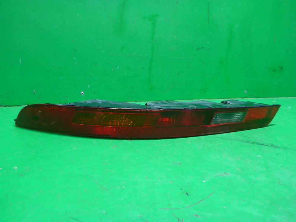 Фонарь задний в бампер левый