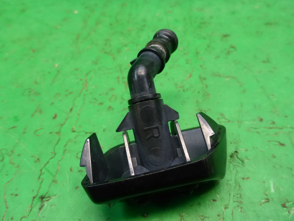 Форсунка омывателя фары