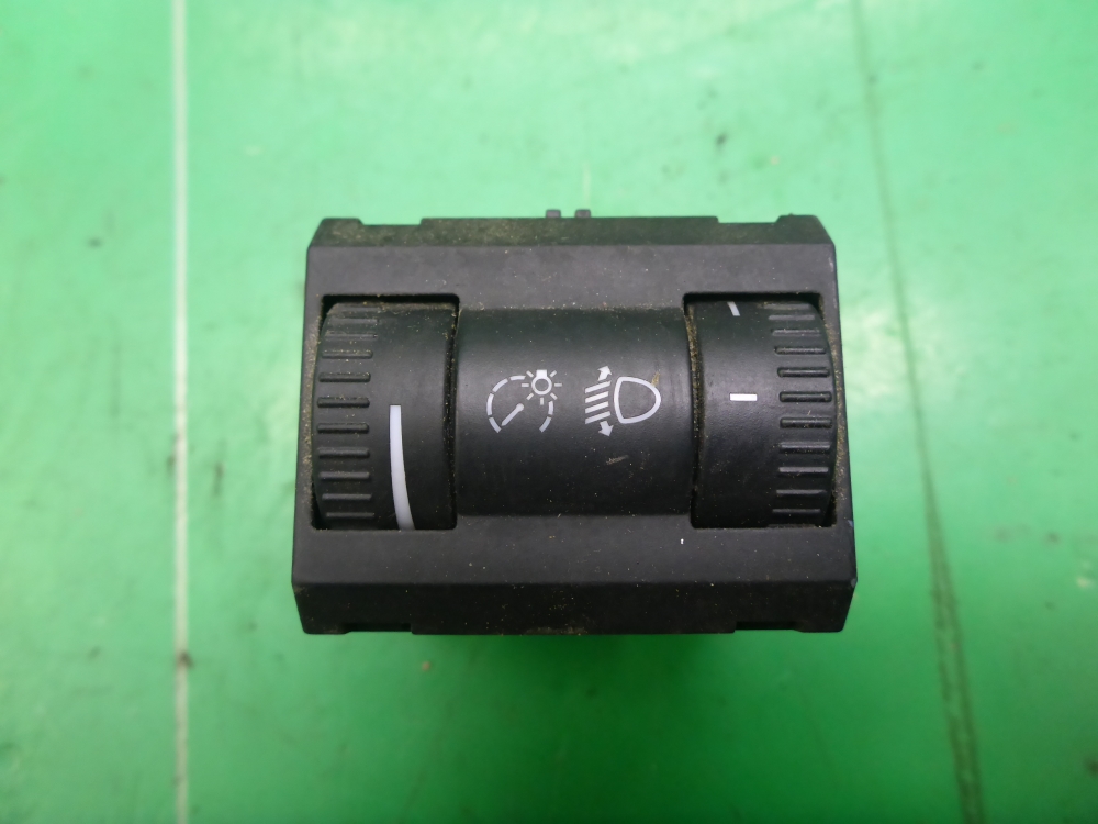 Кнопка корректора фар