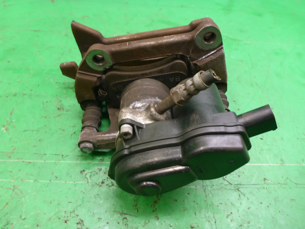 Суппорт задний левый