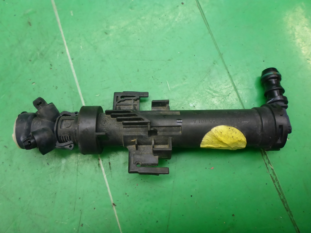 Форсунка омывателя фары