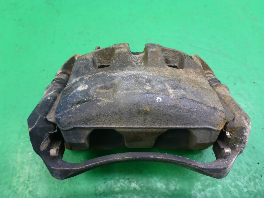 Суппорт передний левый