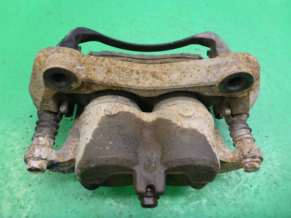 Суппорт передний левый