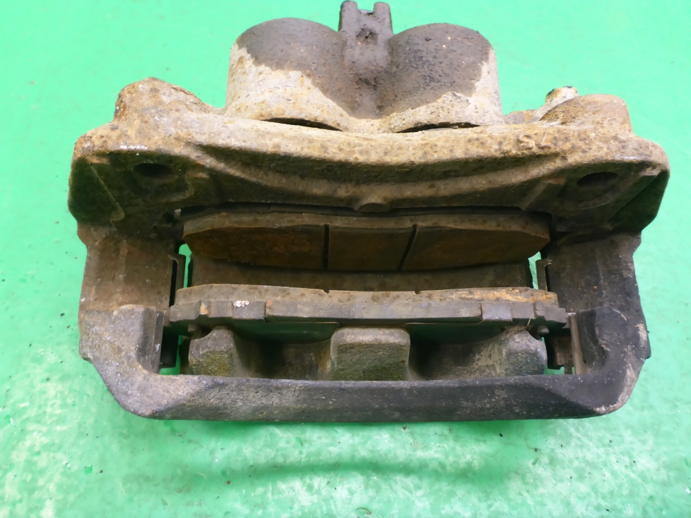 Суппорт передний левый