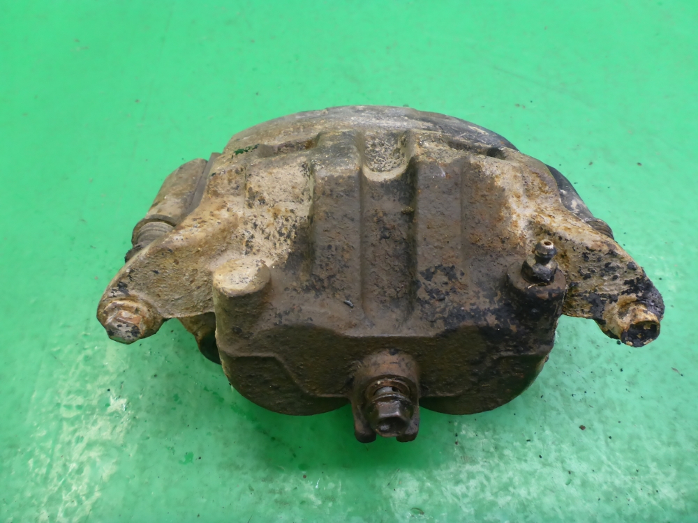 Суппорт передний левый