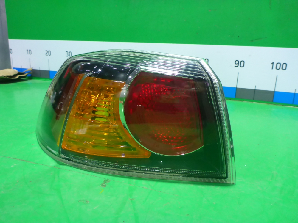 Фонарь задний наружный левый