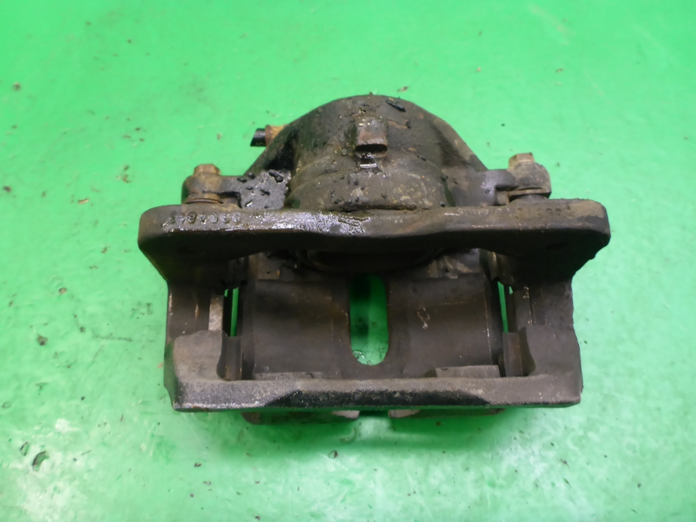 Суппорт передний левый