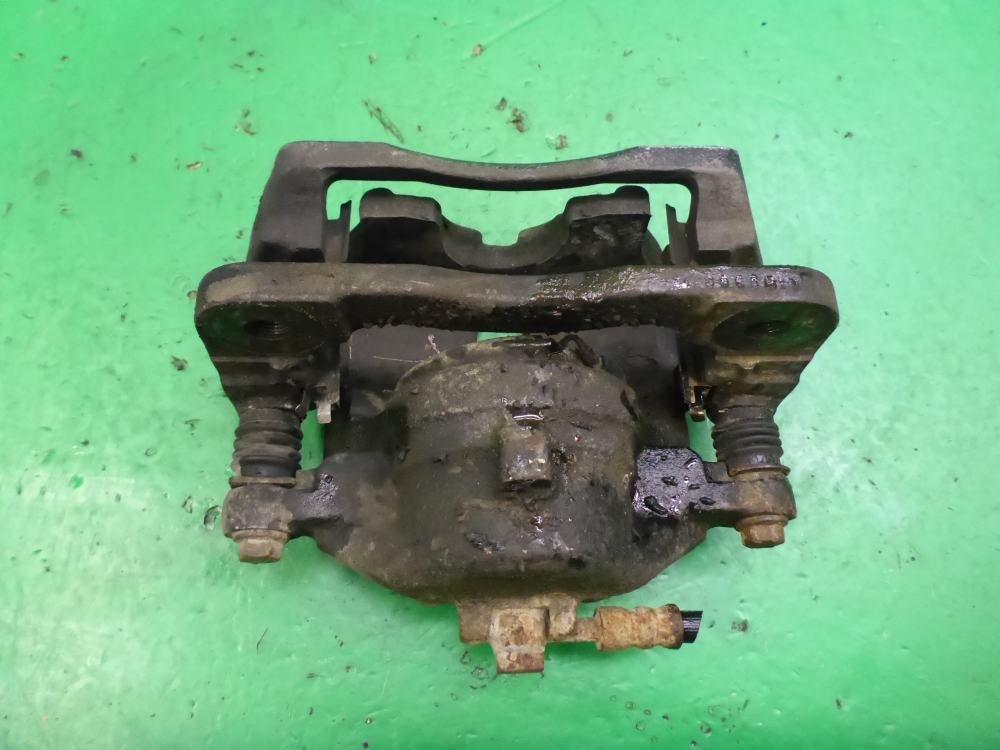 Суппорт передний левый