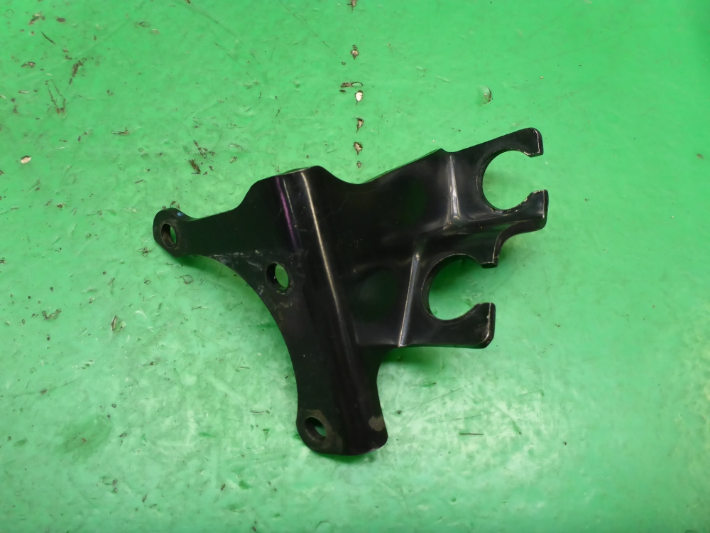 Кронштейн крепления троса КПП