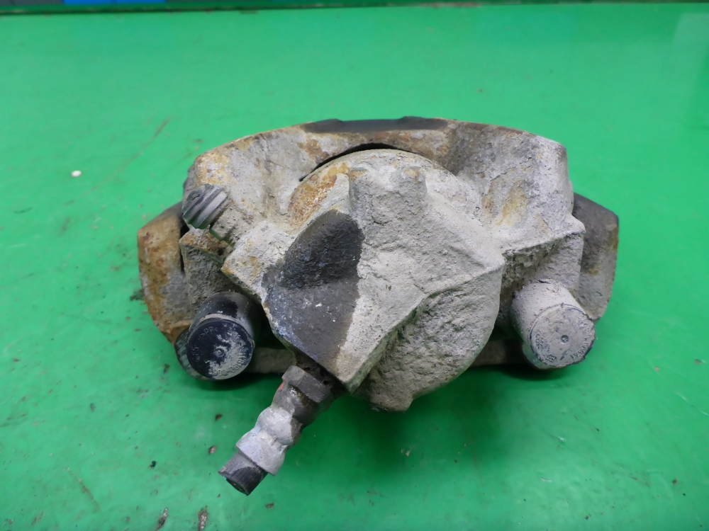 Суппорт передний левый