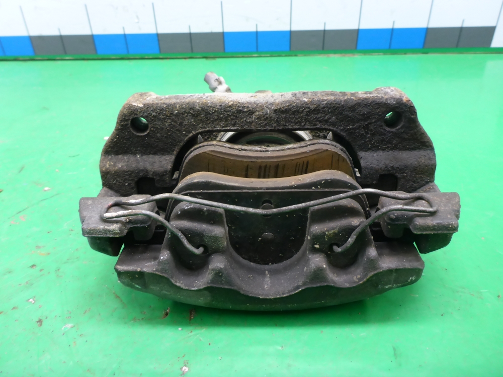 Суппорт передний левый