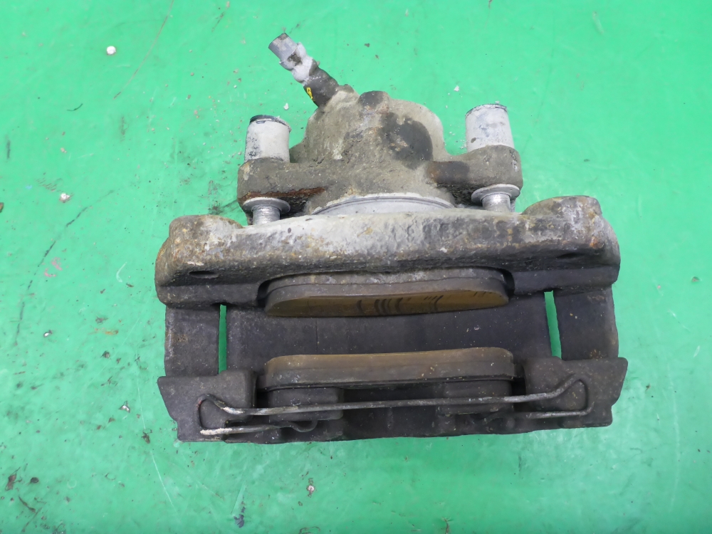 Суппорт передний левый