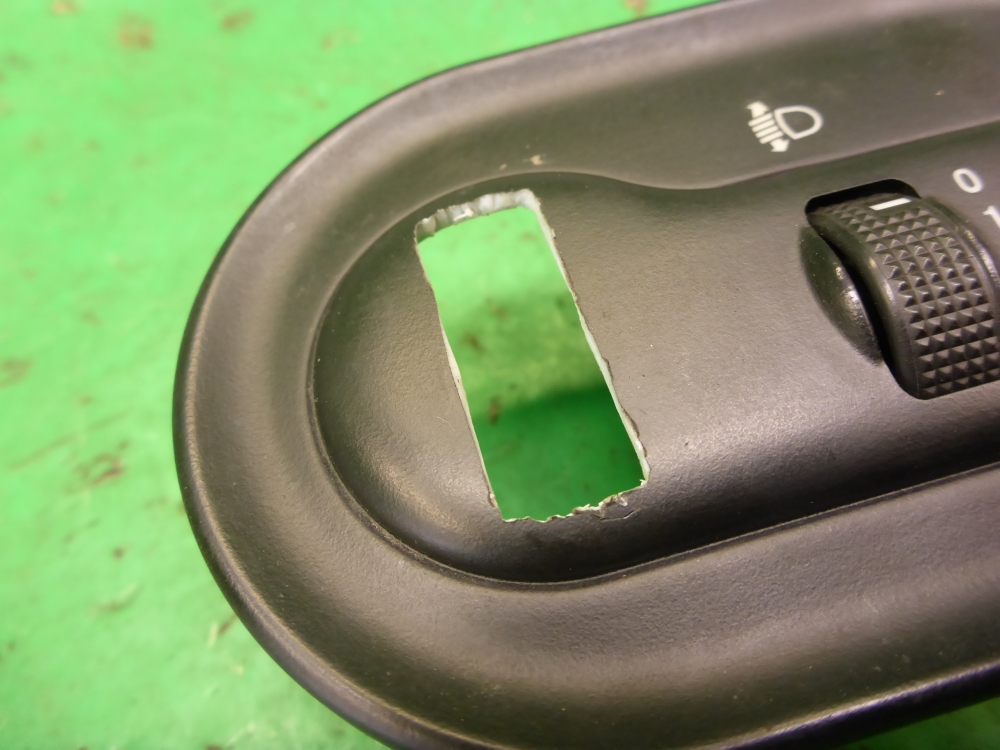 Кнопка корректора фар