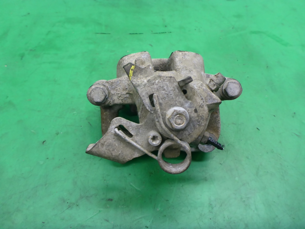 Суппорт задний левый