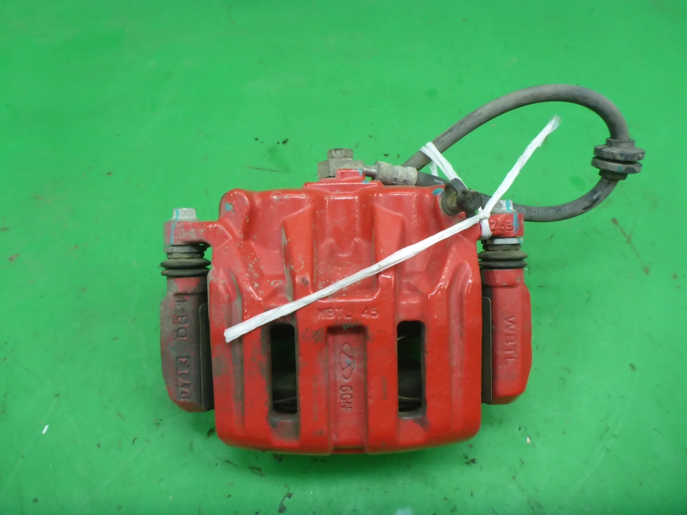 Суппорт передний левый