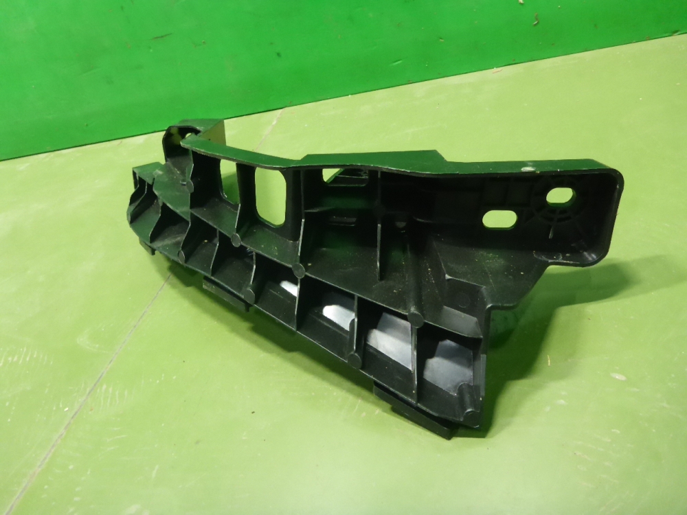 Кронштейн фар левый