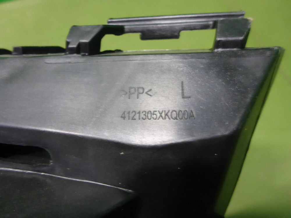 Кронштейн фар левый