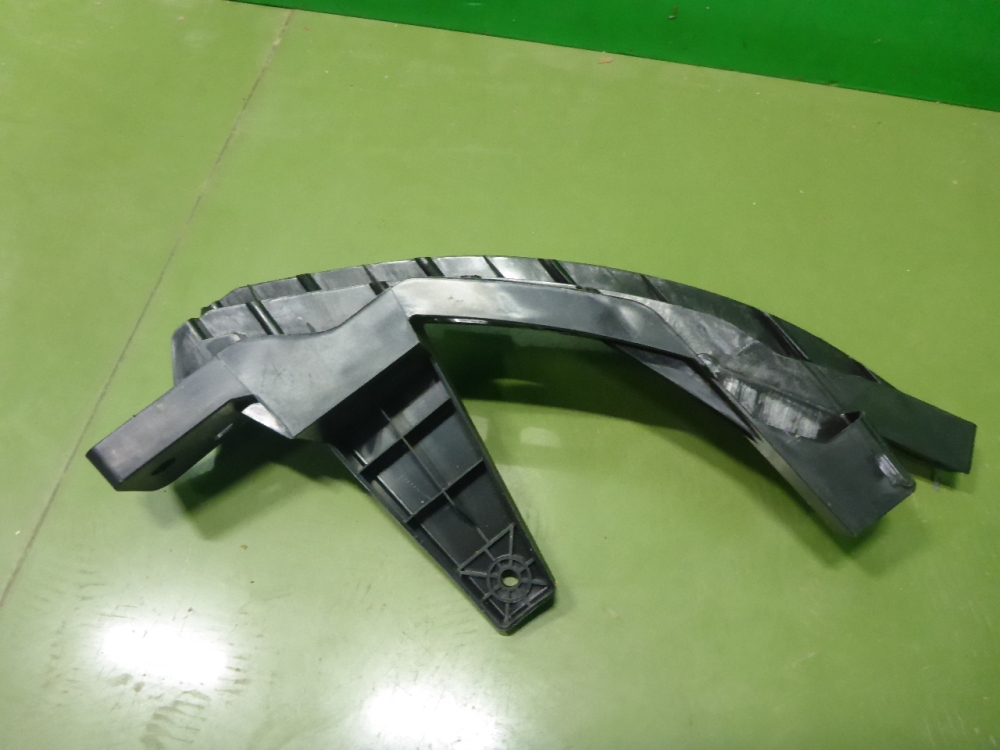 Кронштейн фар левый