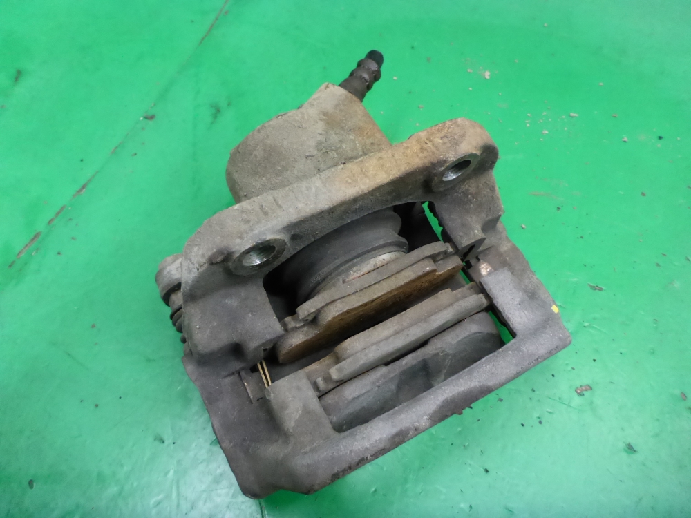 Суппорт передний левый