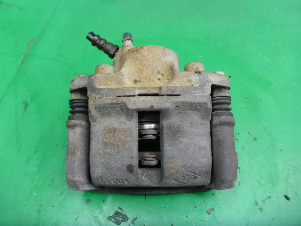 Суппорт передний левый