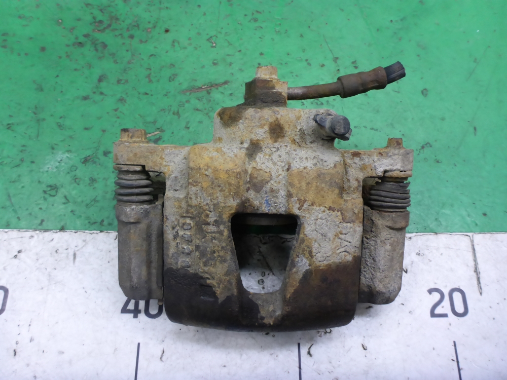 Суппорт передний левый