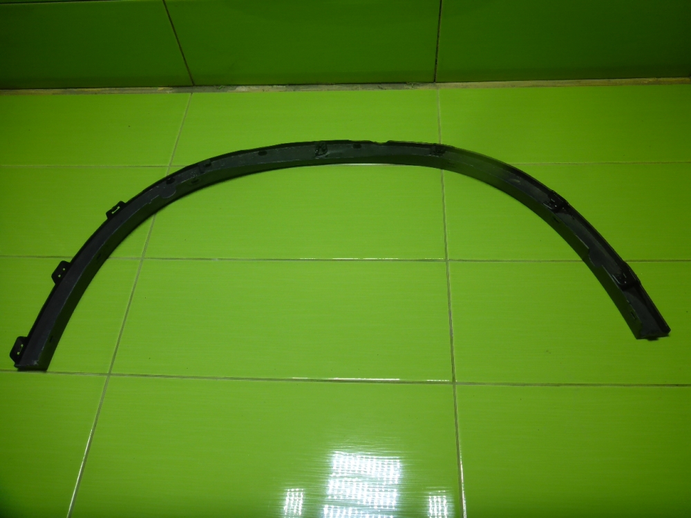 Накладка заднего крыла левого