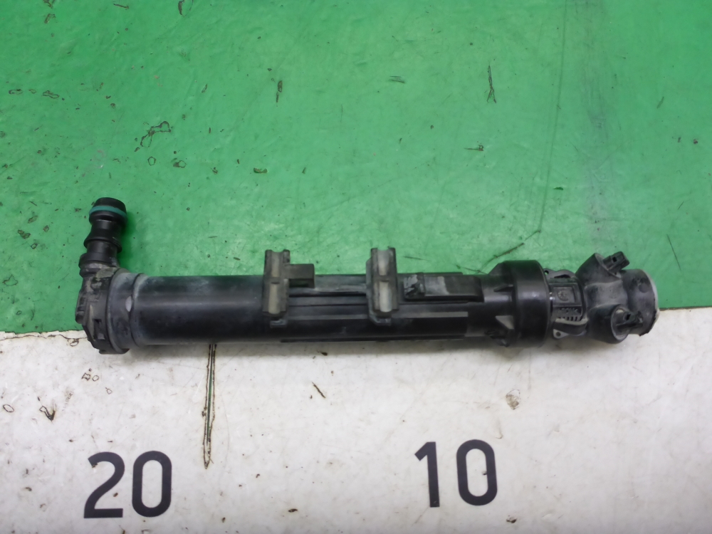 Форсунка омывателя фары