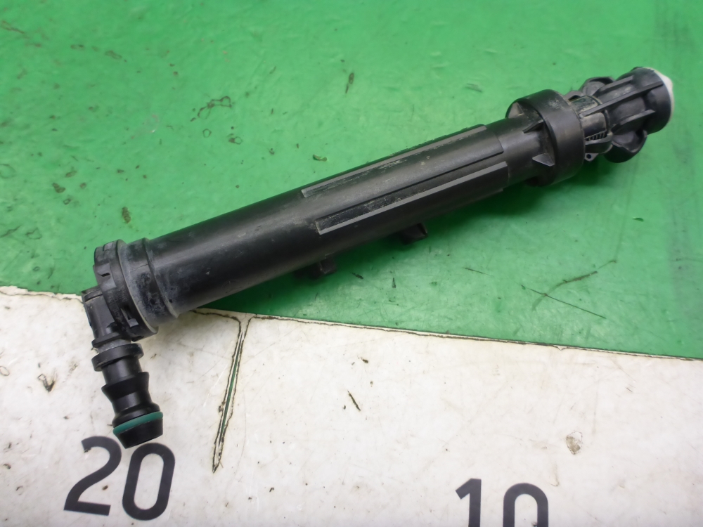 Форсунка омывателя фары