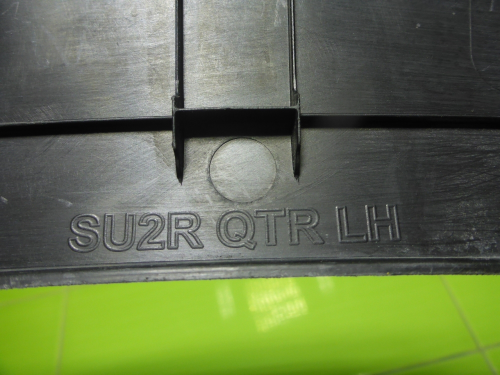 Накладка заднего крыла левого