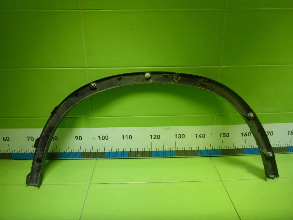 Накладка заднего крыла левого