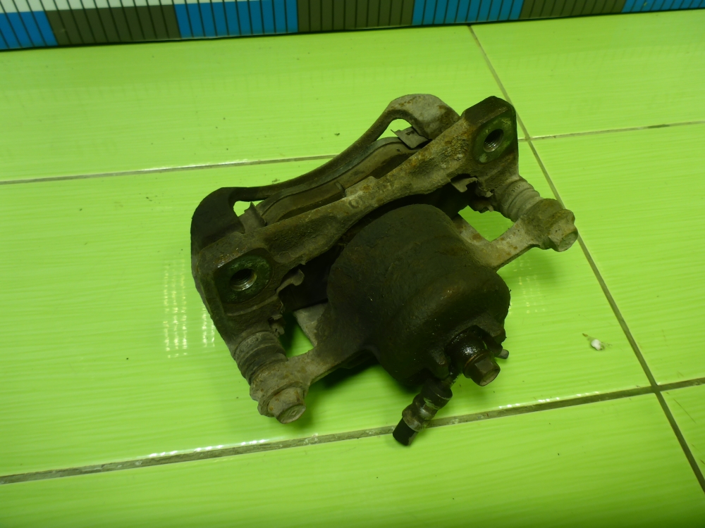 Суппорт передний левый