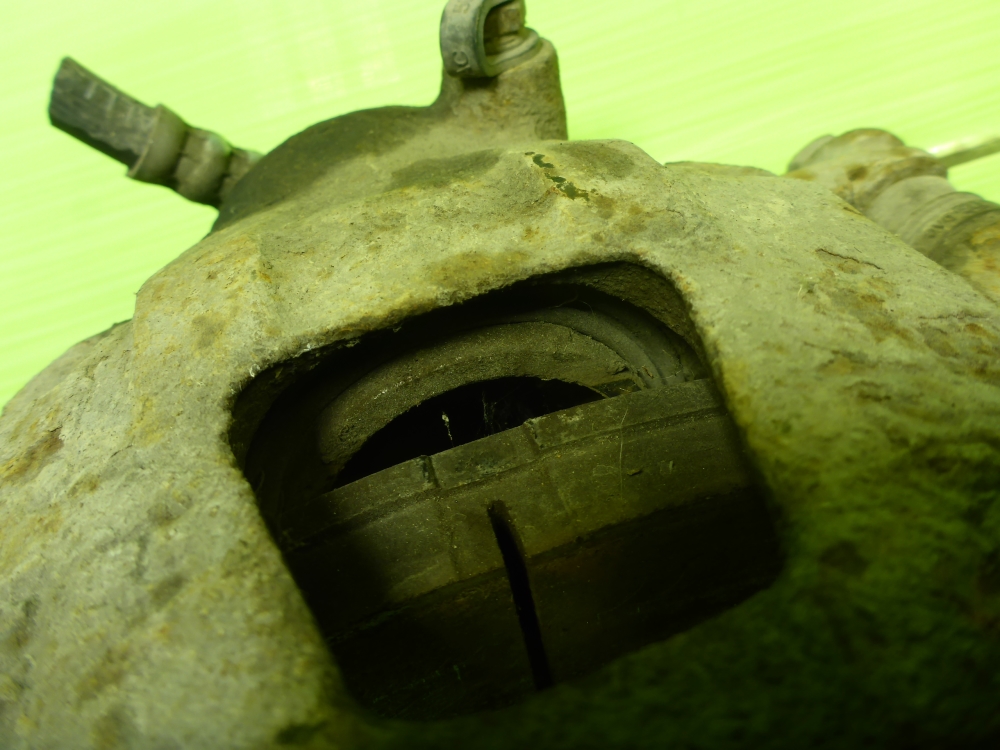 Суппорт передний левый